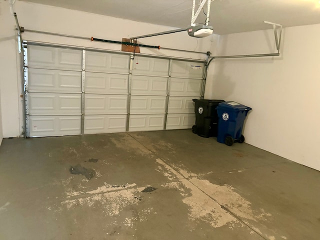 garage featuring a garage door opener