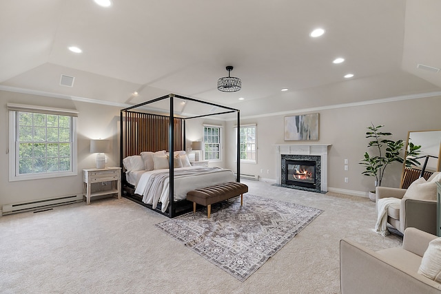 bedroom with a baseboard radiator, light colored carpet, a fireplace, and crown molding