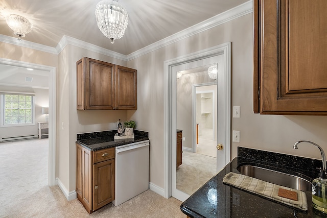 kitchen featuring sink, light carpet, dark stone countertops, white dishwasher, and a notable chandelier