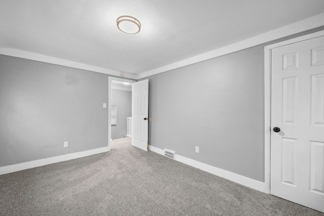 spare room with carpet flooring