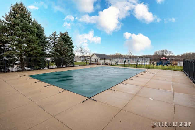 view of pool featuring a patio