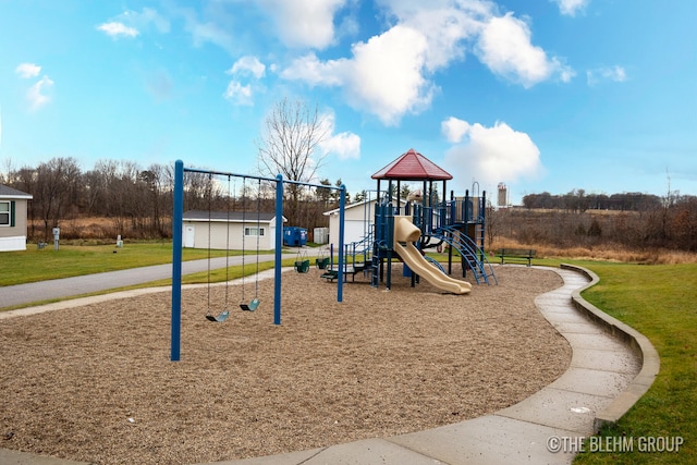 view of playground featuring a lawn