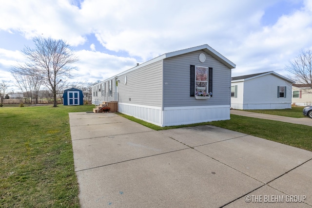 view of property exterior with a lawn and a storage shed