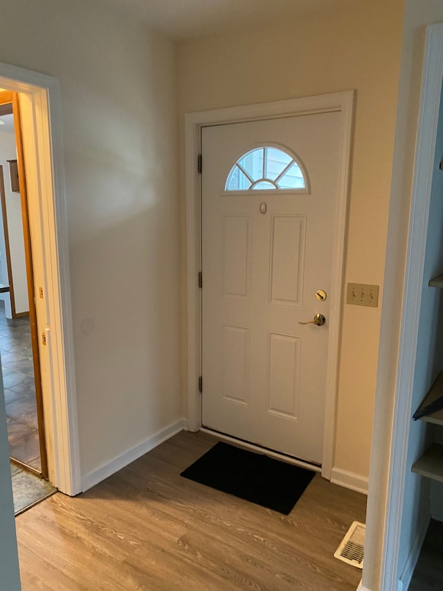 foyer entrance featuring light hardwood / wood-style floors