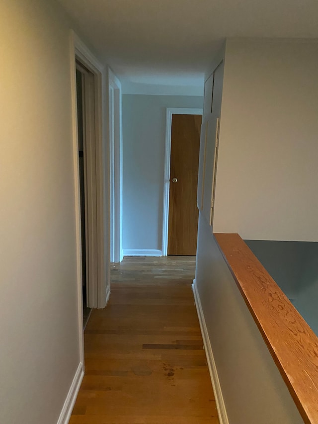 hallway featuring light wood-type flooring