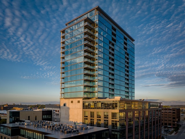 view of outdoor building at dusk