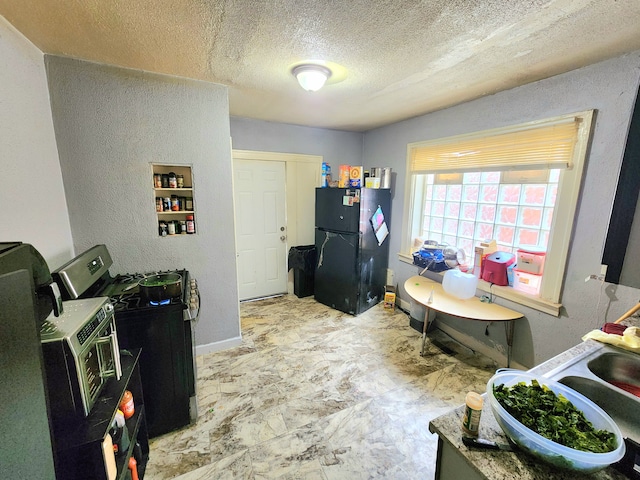 interior space with a textured ceiling