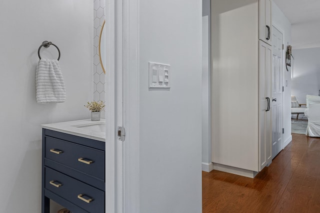 bathroom featuring vanity and wood-type flooring