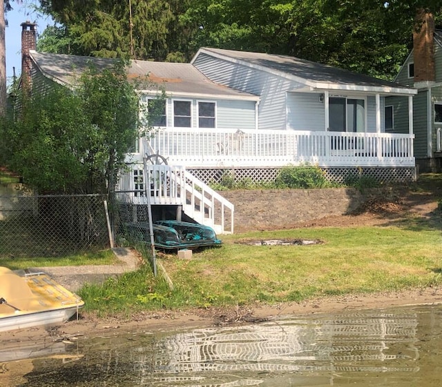 14402 90th Ave, Mecosta, MI 49332 - view of front of house featuring a chimney