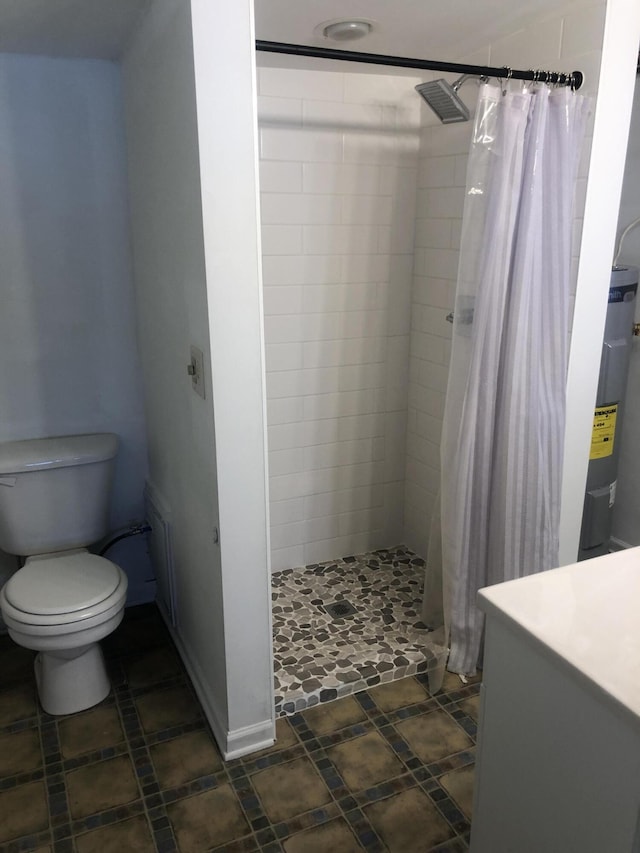 14402 90th Ave, Mecosta, MI 49332 - bathroom featuring vanity, toilet, a shower stall, and radiator
