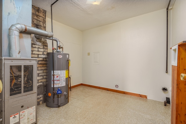 utility room featuring water heater