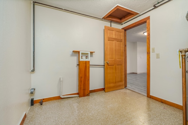 interior space with a textured ceiling