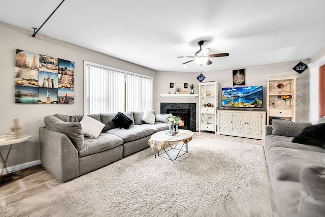 living room featuring ceiling fan