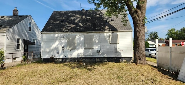 view of home's exterior featuring a lawn