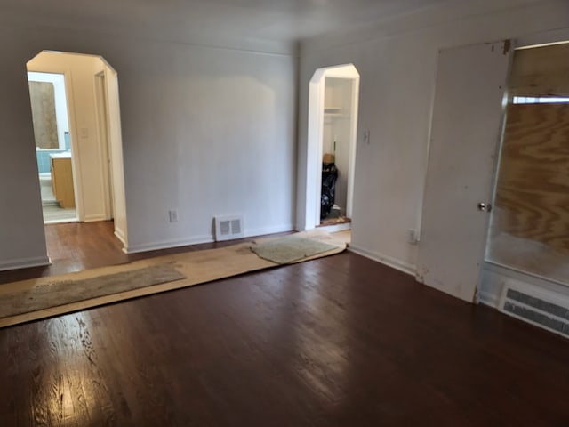 unfurnished room featuring wood-type flooring