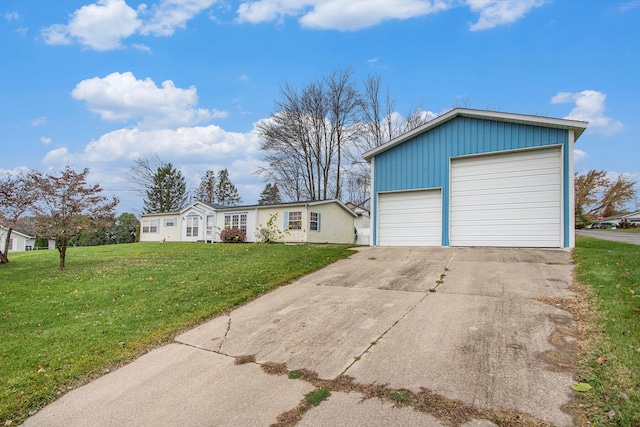 garage featuring a yard