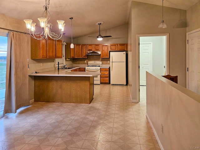 kitchen with sink, kitchen peninsula, vaulted ceiling, white appliances, and ceiling fan with notable chandelier