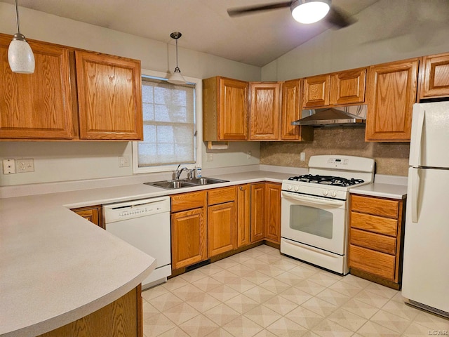 kitchen with ceiling fan, sink, pendant lighting, vaulted ceiling, and white appliances