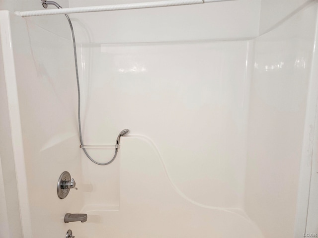 bathroom featuring washtub / shower combination