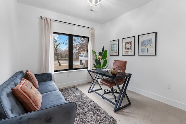 office area with light colored carpet