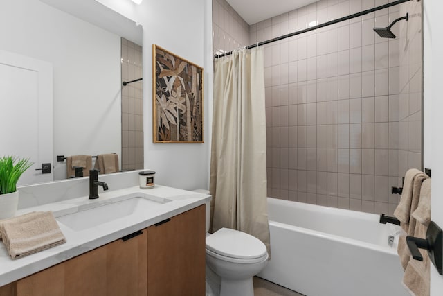 full bathroom featuring shower / bath combination with curtain, toilet, and vanity