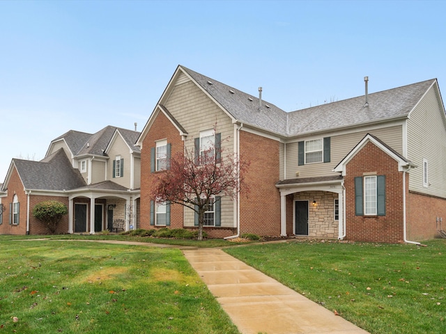 front facade with a front lawn