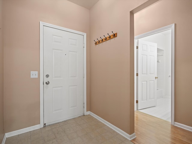 foyer entrance featuring light wood-type flooring