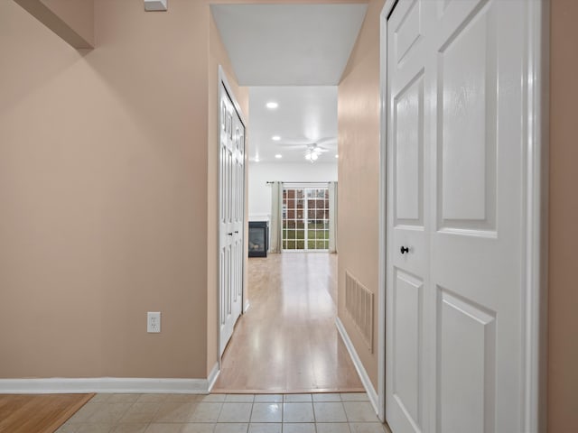 hall featuring light hardwood / wood-style flooring