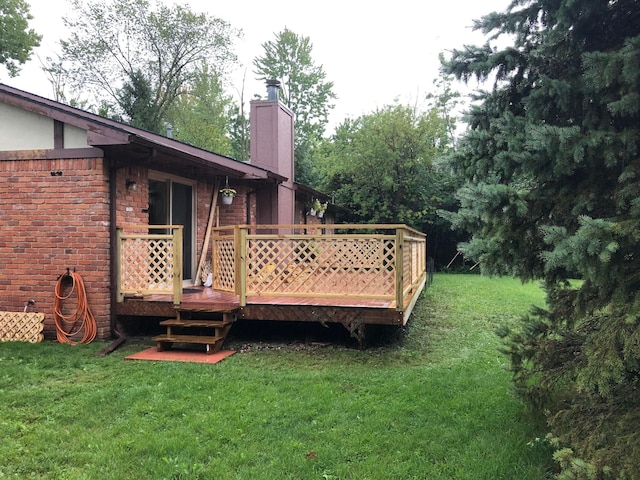 deck featuring a yard