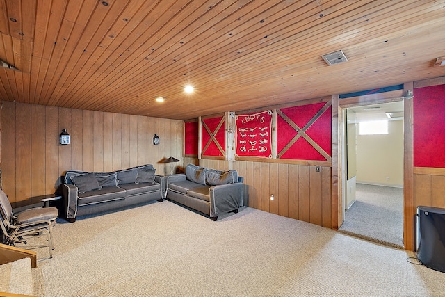 living room featuring wood walls, visible vents, wood ceiling, and carpet floors