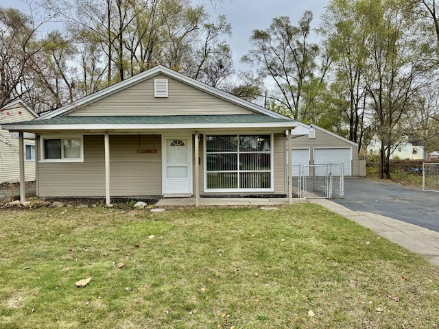 bungalow-style home with a front lawn