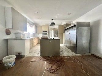 kitchen with a center island and light hardwood / wood-style floors