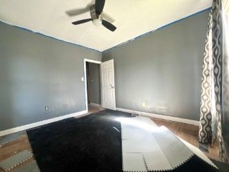 spare room featuring ceiling fan