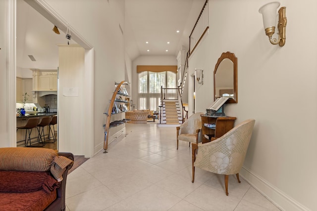 hall with light tile patterned floors