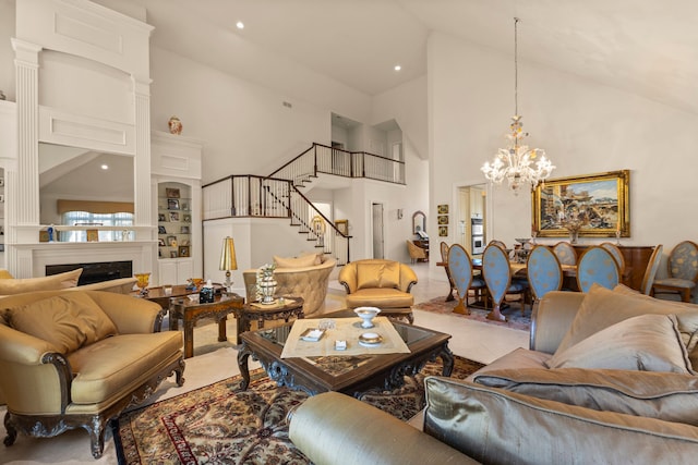 carpeted living room with high vaulted ceiling and a chandelier