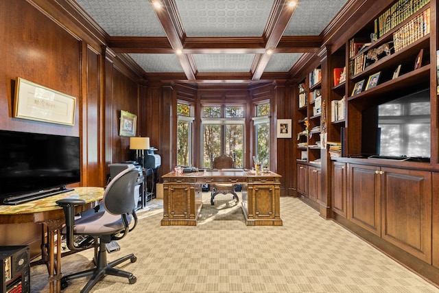 carpeted office with beamed ceiling, crown molding, wooden walls, and coffered ceiling