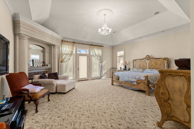 bedroom with a chandelier, light colored carpet, and ornamental molding