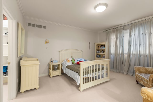 bedroom with light colored carpet and ornamental molding