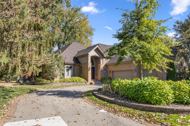 view of front of property with a garage