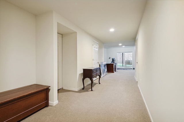 corridor with baseboards, carpet flooring, and recessed lighting