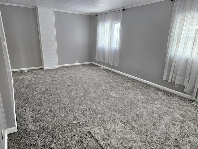 carpeted empty room with crown molding