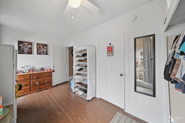 entrance foyer with ceiling fan and dark hardwood / wood-style flooring