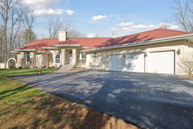 view of front of home with a garage