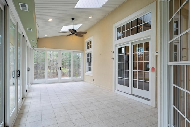 unfurnished sunroom with french doors, lofted ceiling with skylight, ceiling fan, and wooden ceiling