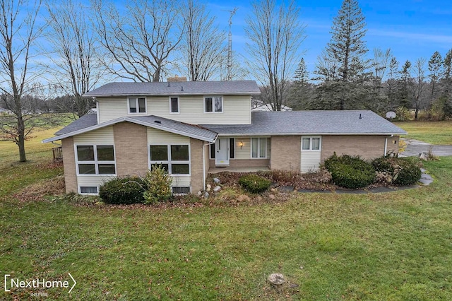 view of front of property with a front lawn