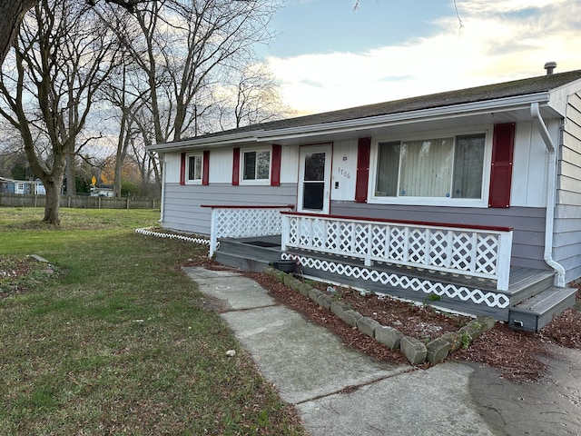 view of front of home with a front lawn