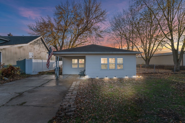 view of property exterior at dusk