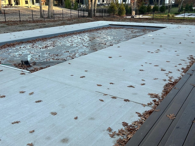 view of pool with fence