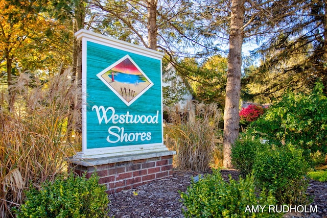 1749 Sunset Point Dr, Norton Shores, MI 49441 - view of community sign