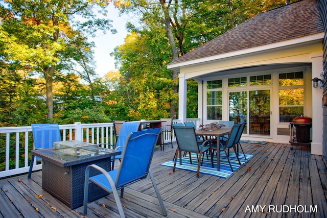 1749 Sunset Point Dr, Norton Shores, MI 49441 - wooden deck featuring outdoor dining area